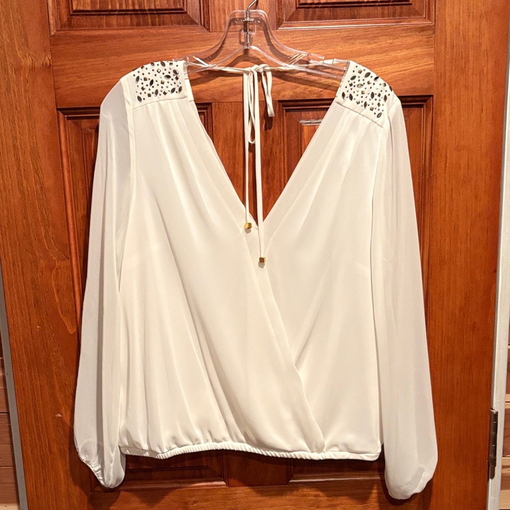 Elegant White Women's Top with Embellished Shoulders